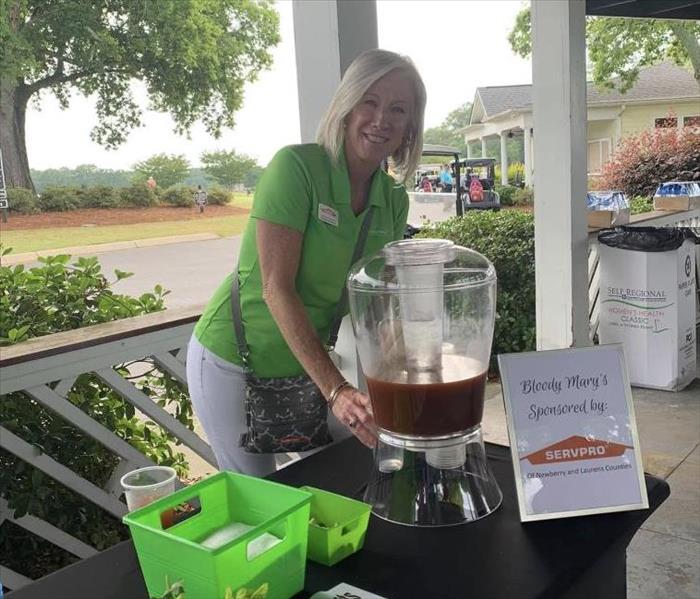 Our Owner Kimberly Kitchens serving up Bloody Mary's for Golf Players