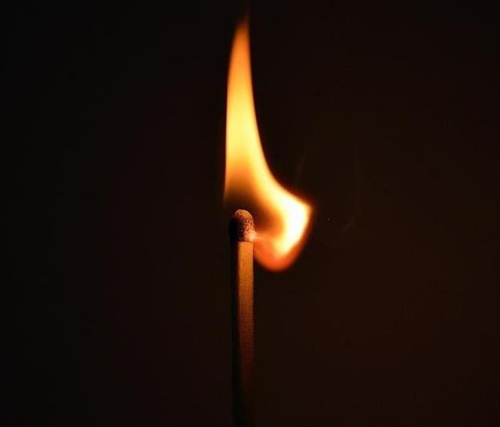 A lite matchstick burning 